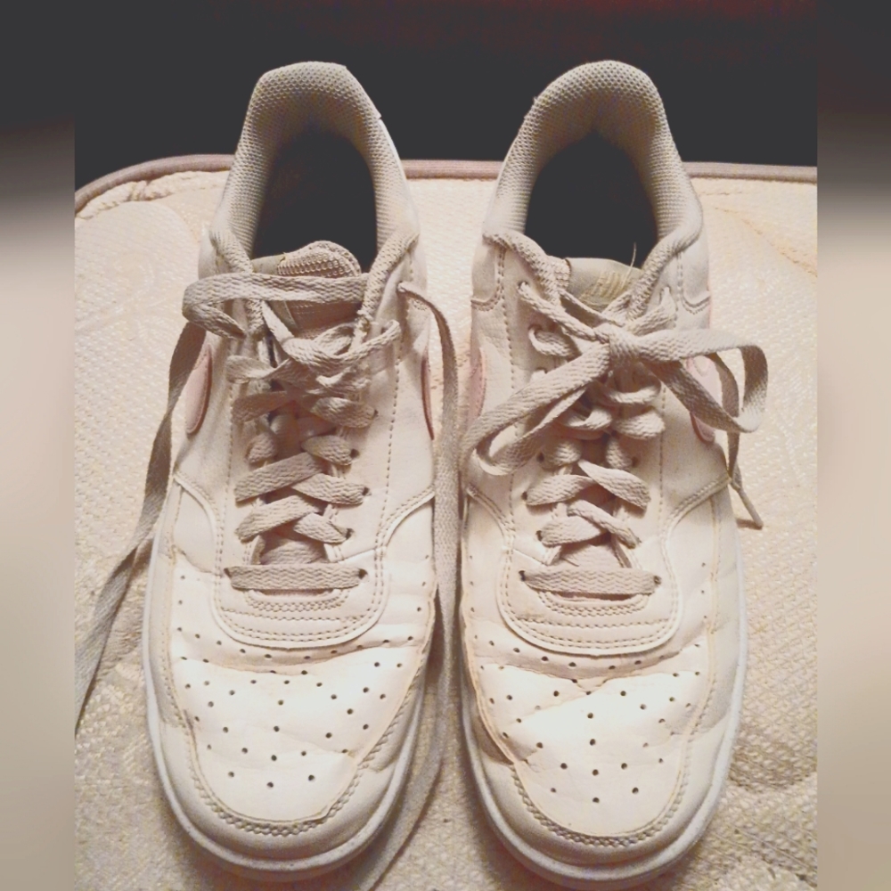 Nike 9.5 white womens with pink swoosh.
